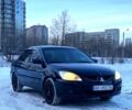Чорний Міцубісі Lancer, об'ємом двигуна 1.6 л та пробігом 228 тис. км за 4599 $, фото 1 на Automoto.ua
