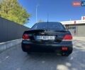 Мицубиси Лансер 2004 в Львове на Automoto.ua Черный Мицубиси Лансер, объемом двигателя 1.58 л и пробегом 463 тыс. км за 3900 $, фото 28 на Automoto.ua
