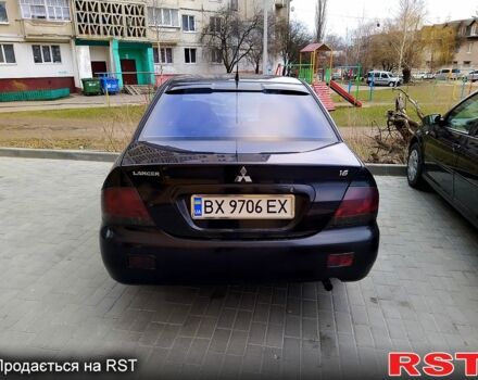 Чорний Міцубісі Lancer, об'ємом двигуна 1.6 л та пробігом 300 тис. км за 4200 $, фото 4 на Automoto.ua