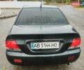 Черный Мицубиси Лансер, объемом двигателя 1.58 л и пробегом 265 тыс. км за 2600 $, фото 6 на Automoto.ua
