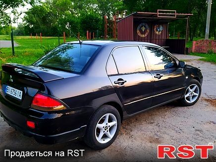 Чорний Міцубісі Lancer, об'ємом двигуна 2 л та пробігом 225 тис. км за 2800 $, фото 1 на Automoto.ua