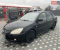 Чорний Міцубісі Lancer, об'ємом двигуна 1.58 л та пробігом 290 тис. км за 3900 $, фото 1 на Automoto.ua