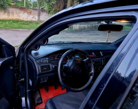 Чорний Міцубісі Lancer, об'ємом двигуна 1.6 л та пробігом 272 тис. км за 3200 $, фото 6 на Automoto.ua