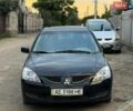 Чорний Міцубісі Lancer, об'ємом двигуна 1.58 л та пробігом 580 тис. км за 1700 $, фото 1 на Automoto.ua
