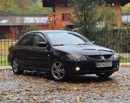 Чорний Міцубісі Lancer, об'ємом двигуна 2 л та пробігом 320 тис. км за 5700 $, фото 3 на Automoto.ua