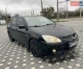 Чорний Міцубісі Lancer, об'ємом двигуна 1.58 л та пробігом 290 тис. км за 3900 $, фото 18 на Automoto.ua