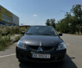 Чорний Міцубісі Lancer, об'ємом двигуна 1.58 л та пробігом 288 тис. км за 5500 $, фото 1 на Automoto.ua