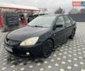 Чорний Міцубісі Lancer, об'ємом двигуна 1.58 л та пробігом 290 тис. км за 3900 $, фото 10 на Automoto.ua
