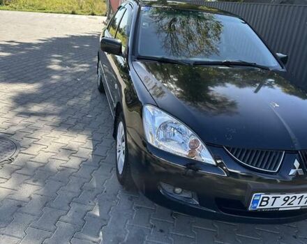 Мицубиси Лансер 2004 в Львове на Automoto.ua Черный Мицубиси Лансер, объемом двигателя 1.58 л и пробегом 463 тыс. км за 3900 $, фото 24 на Automoto.ua