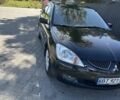 Мицубиси Лансер 2004 в Львове на Automoto.ua Черный Мицубиси Лансер, объемом двигателя 1.58 л и пробегом 463 тыс. км за 3900 $, фото 24 на Automoto.ua