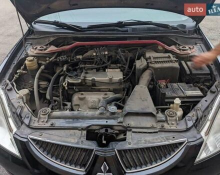 Черный Мицубиси Лансер, объемом двигателя 1.58 л и пробегом 240 тыс. км за 3700 $, фото 13 на Automoto.ua