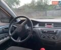 Черный Мицубиси Лансер, объемом двигателя 1.58 л и пробегом 172 тыс. км за 5700 $, фото 6 на Automoto.ua