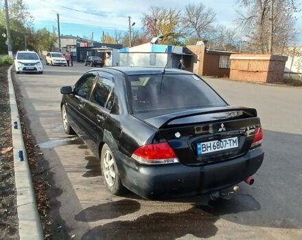 Чорний Міцубісі Lancer, об'ємом двигуна 1.6 л та пробігом 178 тис. км за 2616 $, фото 3 на Automoto.ua