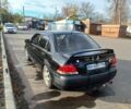 Чорний Міцубісі Lancer, об'ємом двигуна 1.6 л та пробігом 178 тис. км за 2616 $, фото 3 на Automoto.ua