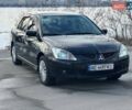 Черный Мицубиси Лансер, объемом двигателя 1.6 л и пробегом 281 тыс. км за 2850 $, фото 1 на Automoto.ua