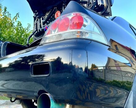 Черный Мицубиси Лансер, объемом двигателя 1.6 л и пробегом 300 тыс. км за 3650 $, фото 7 на Automoto.ua