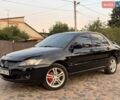 Черный Мицубиси Лансер, объемом двигателя 2 л и пробегом 229 тыс. км за 3250 $, фото 1 на Automoto.ua