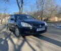 Черный Мицубиси Лансер, объемом двигателя 1.6 л и пробегом 240 тыс. км за 3550 $, фото 1 на Automoto.ua