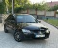 Черный Мицубиси Лансер, объемом двигателя 1.6 л и пробегом 280 тыс. км за 4010 $, фото 1 на Automoto.ua