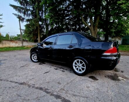 Чорний Міцубісі Lancer, об'ємом двигуна 1.6 л та пробігом 272 тис. км за 3200 $, фото 4 на Automoto.ua