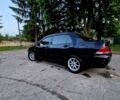 Чорний Міцубісі Lancer, об'ємом двигуна 1.6 л та пробігом 272 тис. км за 3200 $, фото 4 на Automoto.ua