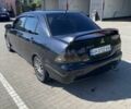 Чорний Міцубісі Lancer, об'ємом двигуна 2 л та пробігом 290 тис. км за 5550 $, фото 2 на Automoto.ua