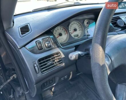 Мицубиси Лансер 2004 в Львове на Automoto.ua Черный Мицубиси Лансер, объемом двигателя 1.58 л и пробегом 463 тыс. км за 3900 $, фото 17 на Automoto.ua