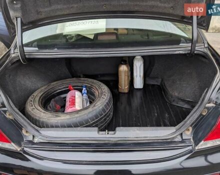 Черный Мицубиси Лансер, объемом двигателя 1.58 л и пробегом 240 тыс. км за 3700 $, фото 6 на Automoto.ua