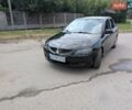 Черный Мицубиси Лансер, объемом двигателя 2 л и пробегом 230 тыс. км за 2650 $, фото 1 на Automoto.ua