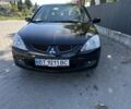 Мицубиси Лансер 2004 в Львове на Automoto.ua Черный Мицубиси Лансер, объемом двигателя 1.58 л и пробегом 463 тыс. км за 3900 $, фото 4 на Automoto.ua