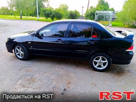Чорний Міцубісі Lancer, об'ємом двигуна 2 л та пробігом 225 тис. км за 2800 $, фото 2 на Automoto.ua