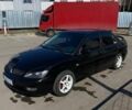 Чорний Міцубісі Lancer, об'ємом двигуна 2 л та пробігом 289 тис. км за 3499 $, фото 1 на Automoto.ua