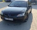 Черный Мицубиси Лансер, объемом двигателя 1.6 л и пробегом 380 тыс. км за 3550 $, фото 7 на Automoto.ua