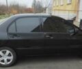 Черный Мицубиси Лансер, объемом двигателя 1.58 л и пробегом 240 тыс. км за 3700 $, фото 3 на Automoto.ua