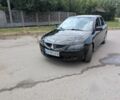 Чорний Міцубісі Lancer, об'ємом двигуна 2 л та пробігом 230 тис. км за 2661 $, фото 1 на Automoto.ua