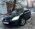 Чорний Міцубісі Lancer, об'ємом двигуна 1.58 л та пробігом 266 тис. км за 3600 $, фото 1 на Automoto.ua