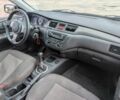 Чорний Міцубісі Lancer, об'ємом двигуна 2 л та пробігом 200 тис. км за 500 $, фото 1 на Automoto.ua