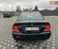 Чорний Міцубісі Lancer, об'ємом двигуна 1.58 л та пробігом 290 тис. км за 3900 $, фото 11 на Automoto.ua