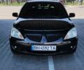 Чорний Міцубісі Lancer, об'ємом двигуна 1.6 л та пробігом 351 тис. км за 3950 $, фото 1 на Automoto.ua