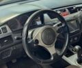 Черный Мицубиси Лансер, объемом двигателя 2 л и пробегом 272 тыс. км за 4000 $, фото 1 на Automoto.ua