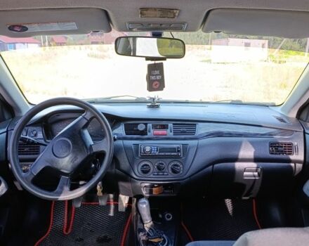 Мицубиси Лансер 2004 в Дрогобыче на Automoto.ua Черный Мицубиси Лансер, объемом двигателя 1.6 л и пробегом 260 тыс. км за 3750 $, фото 10 на Automoto.ua