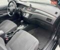 Чорний Міцубісі Lancer, об'ємом двигуна 1.58 л та пробігом 290 тис. км за 3900 $, фото 21 на Automoto.ua