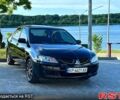 Черный Мицубиси Лансер, объемом двигателя 1.6 л и пробегом 280 тыс. км за 4550 $, фото 1 на Automoto.ua