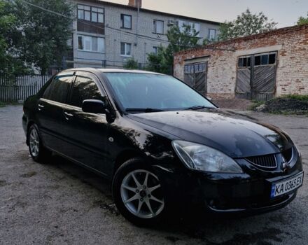 Чорний Міцубісі Lancer, об'ємом двигуна 1.6 л та пробігом 272 тис. км за 3200 $, фото 1 на Automoto.ua