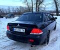 Чорний Міцубісі Lancer, об'ємом двигуна 1.6 л та пробігом 228 тис. км за 4599 $, фото 6 на Automoto.ua