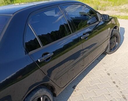 Мицубиси Лансер 2004 в Дрогобыче на Automoto.ua Черный Мицубиси Лансер, объемом двигателя 1.6 л и пробегом 260 тыс. км за 3750 $, фото 13 на Automoto.ua