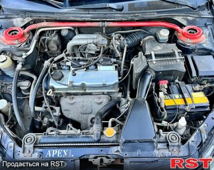 Черный Мицубиси Лансер, объемом двигателя 1.6 л и пробегом 300 тыс. км за 3650 $, фото 6 на Automoto.ua