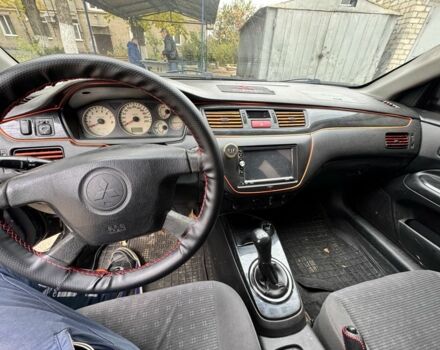 Мицубиси Лансер 2004 в Ивано-Франковске на Automoto.ua Черный Мицубиси Лансер, объемом двигателя 1.6 л и пробегом 280 тыс. км за 2500 $, фото 4 на Automoto.ua