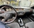 Мицубиси Лансер 2004 в Ивано-Франковске на Automoto.ua Черный Мицубиси Лансер, объемом двигателя 1.6 л и пробегом 280 тыс. км за 2500 $, фото 4 на Automoto.ua