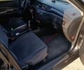 Мицубиси Лансер 2004 в Дрогобыче на Automoto.ua Черный Мицубиси Лансер, объемом двигателя 1.6 л и пробегом 260 тыс. км за 3750 $, фото 7 на Automoto.ua
